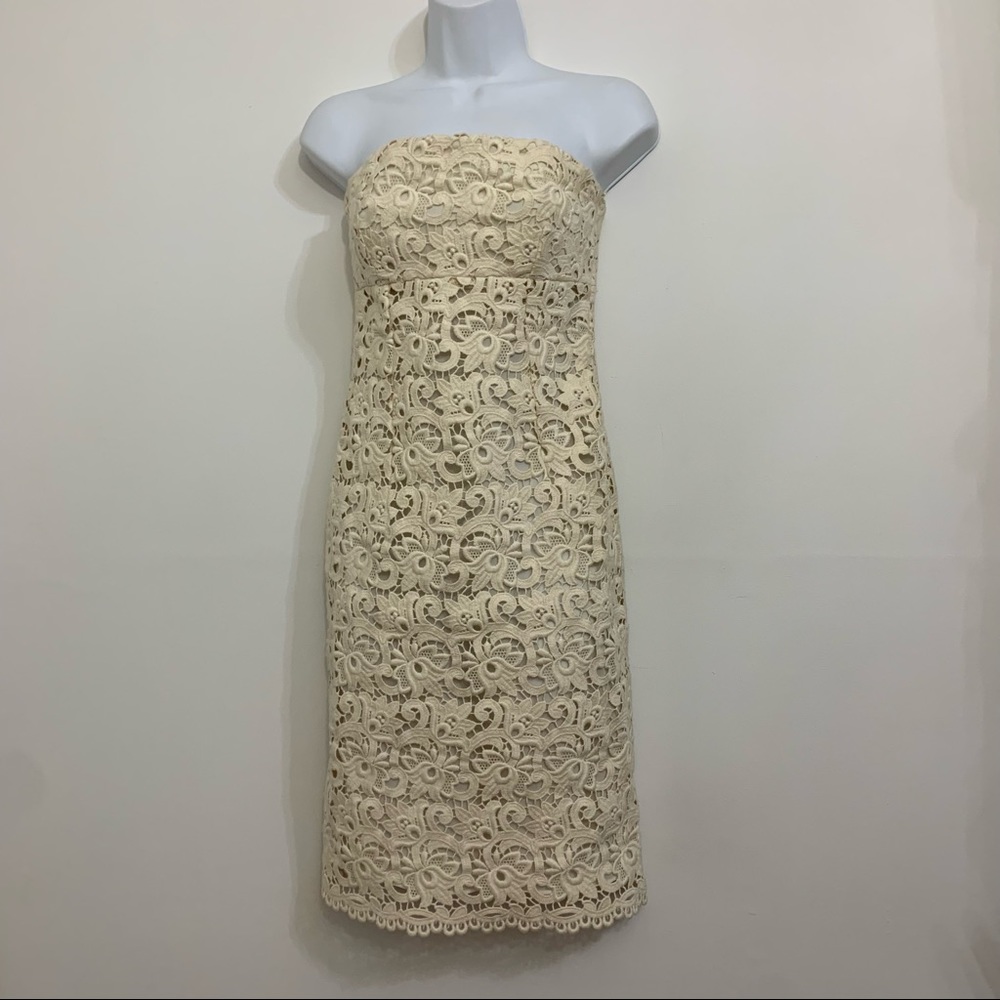 Ivory lace dress by Michael Kors is in like new condition. Size 2 - Picture 5 of 16